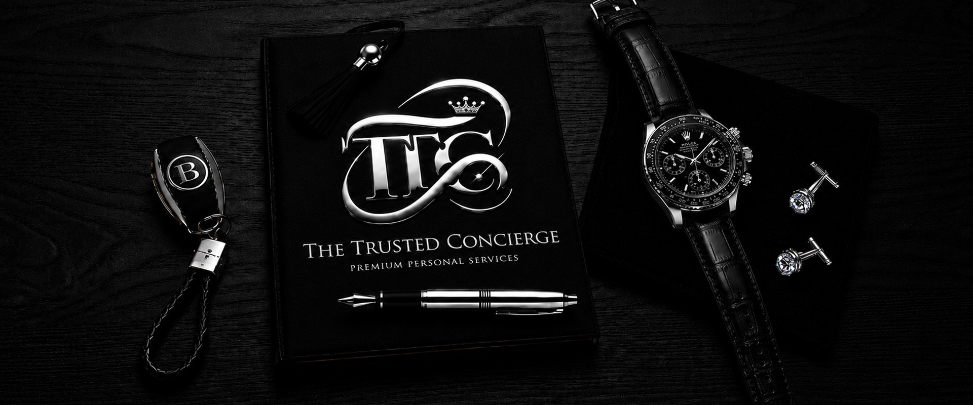 The Trusted Concierge portfolio with watch, pen and luxury details